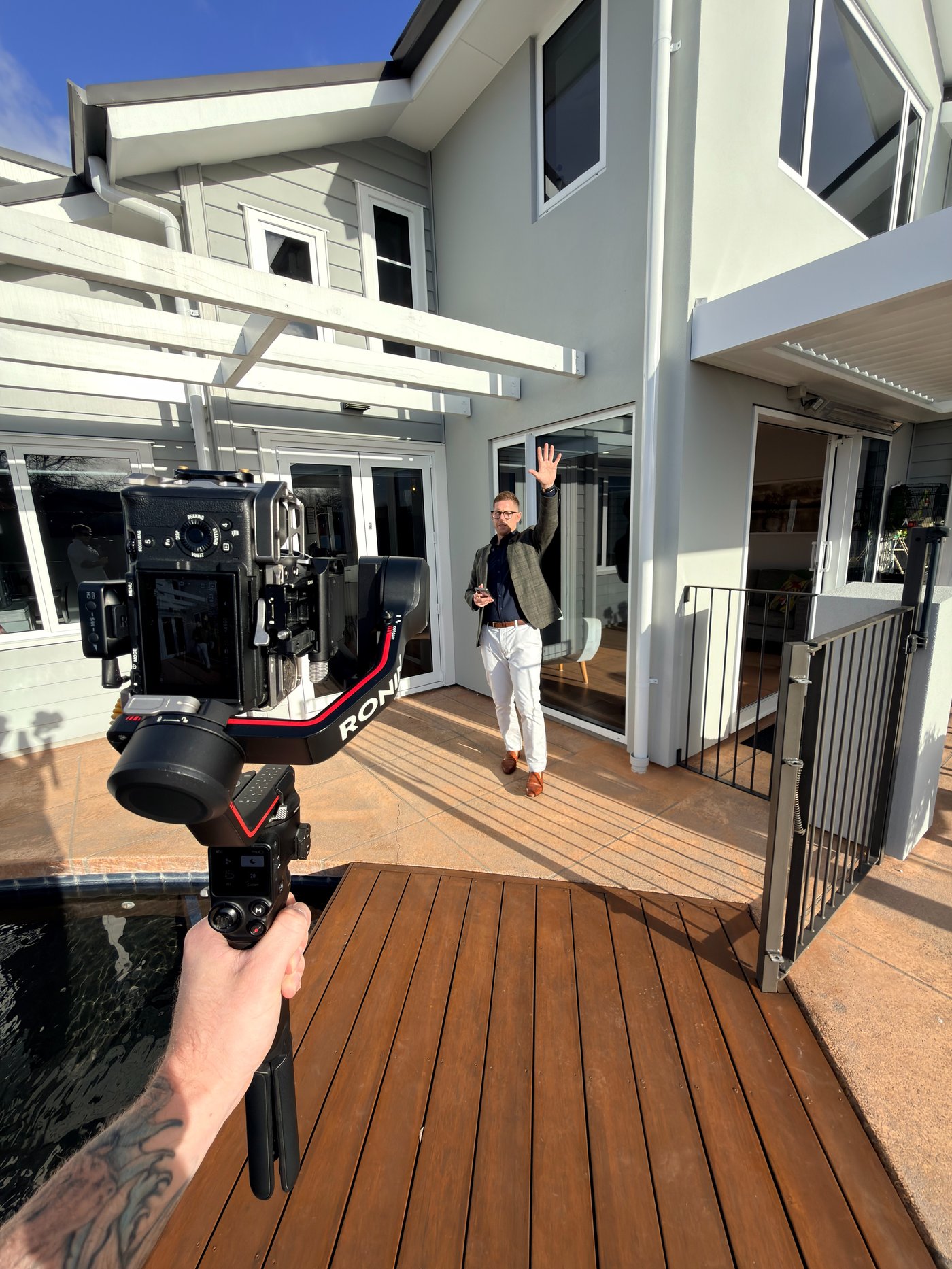 Behind the scenes filming a property video, Whitehouse Media